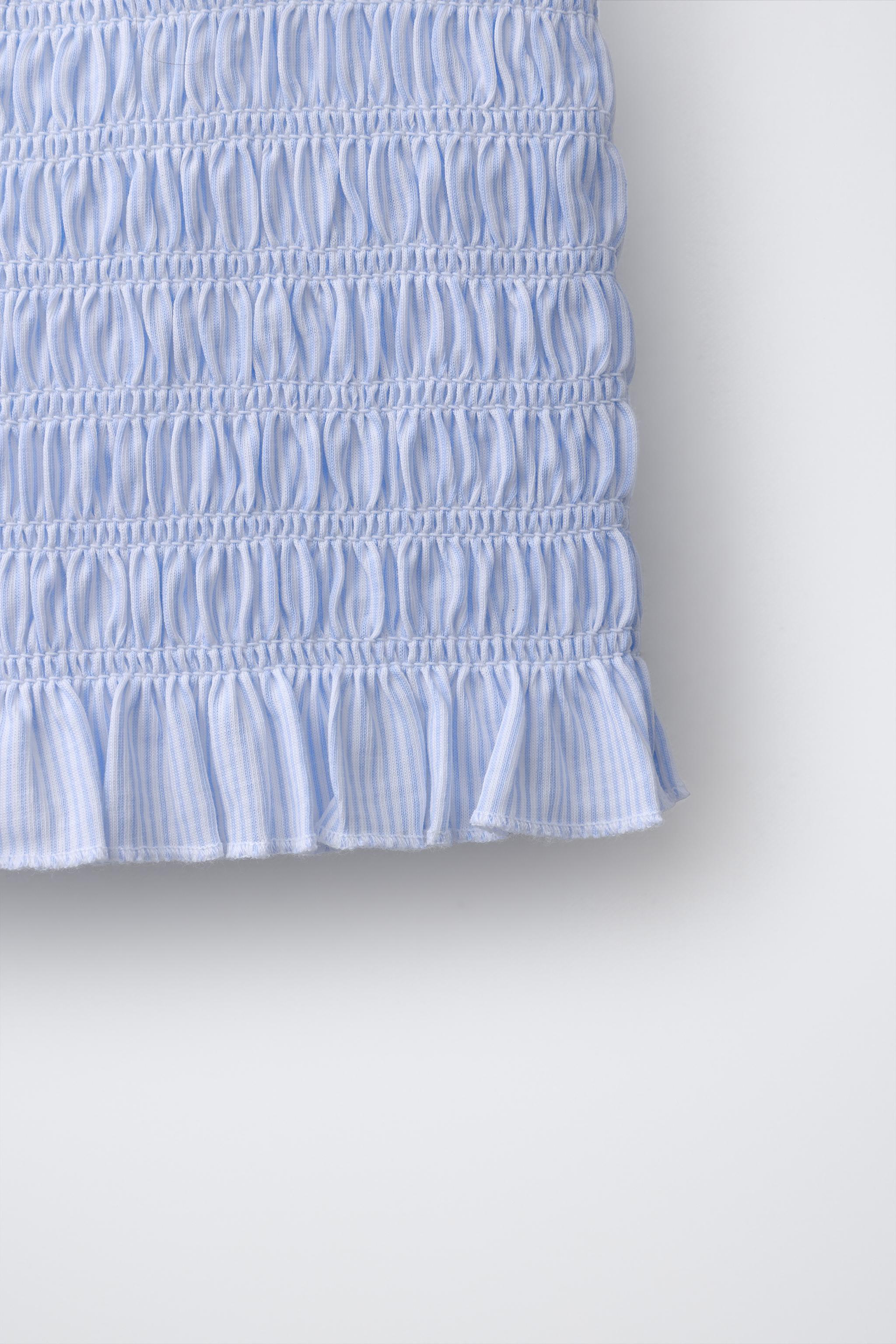 SMOCKED ELASTICIZED TOP